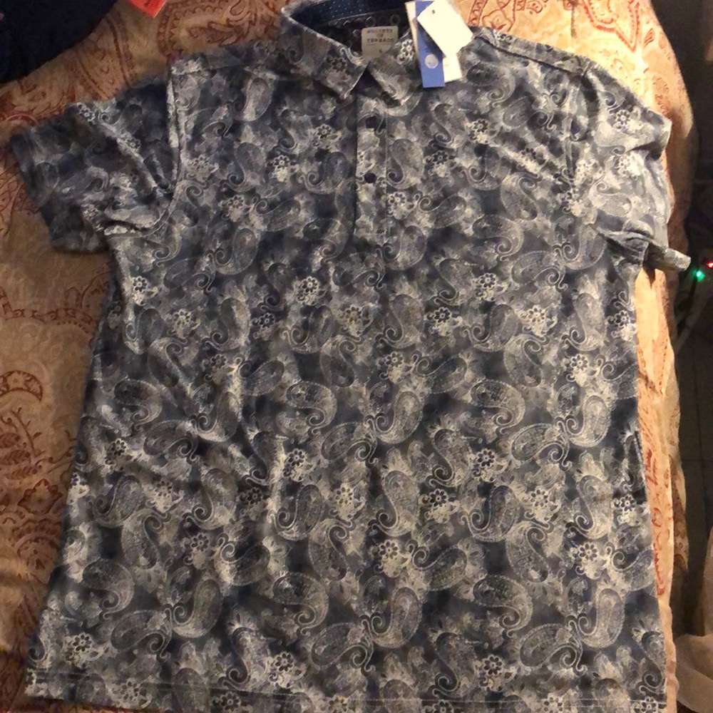 A blue button up shirt.